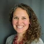 Professional woman smiling, business expert, corporate consulting, professional headshot.